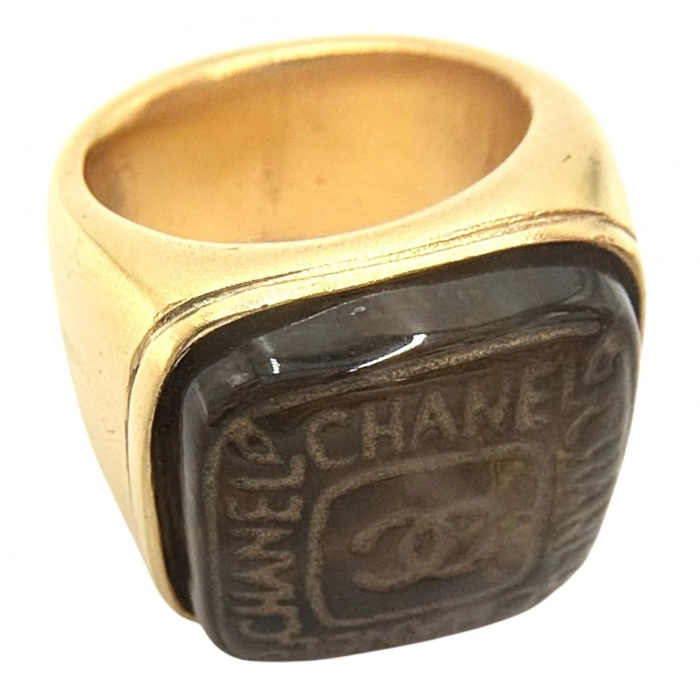 Chanel women's ring, Coco Mark design, gold-plated, with a colored stone, app...